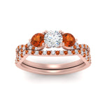Load image into Gallery viewer, round-cut-twisted-floral-prong-orange-sapphire-wedding-set-in-rose-gold-FD10257ROGSAOR-ANGLE5-NL-RG_968621ca-035b-4461-bbe3-d55d60996eb4?v=1756360189

