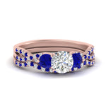 Load image into Gallery viewer, round-cut-twisted-floral-prong-sapphire-wedding-set-in-rose-gold-FD10257ROGSABL-NL-RG?v=1756360083
