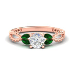 Load image into Gallery viewer, round-cut-twisted-leaf-emerald-split-engagement-ring-in-rose-gold-fdenr1084gemgrsleep-nl-rg_b88402ef-d171-4f7d-b505-6beee3a3c455.jpg?v=1764581107
