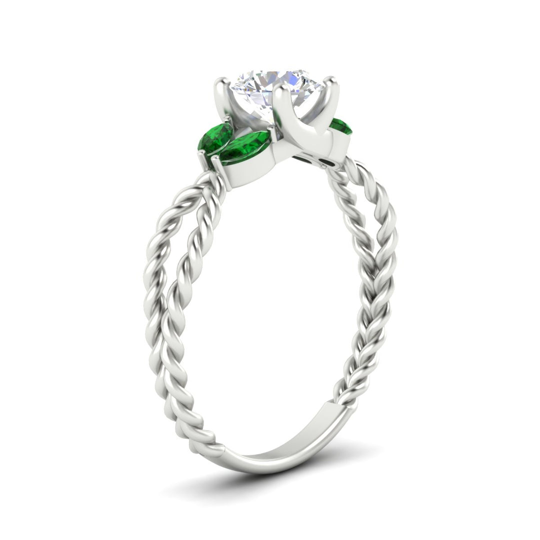 round-cut-twisted-leaf-emerald-split-engagement-ring-in-white-gold-fdenr1084gemgrangle2-nl-wg.jpg?v=1764581094