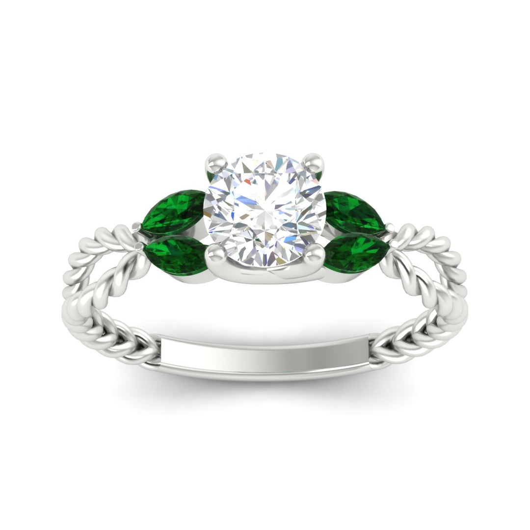 round-cut-twisted-leaf-emerald-split-engagement-ring-in-white-gold-fdenr1084gemgrangle5-nl-wg_b18ba062-2c65-4781-a886-a8848e9c9cf5.jpg?v=1764581107