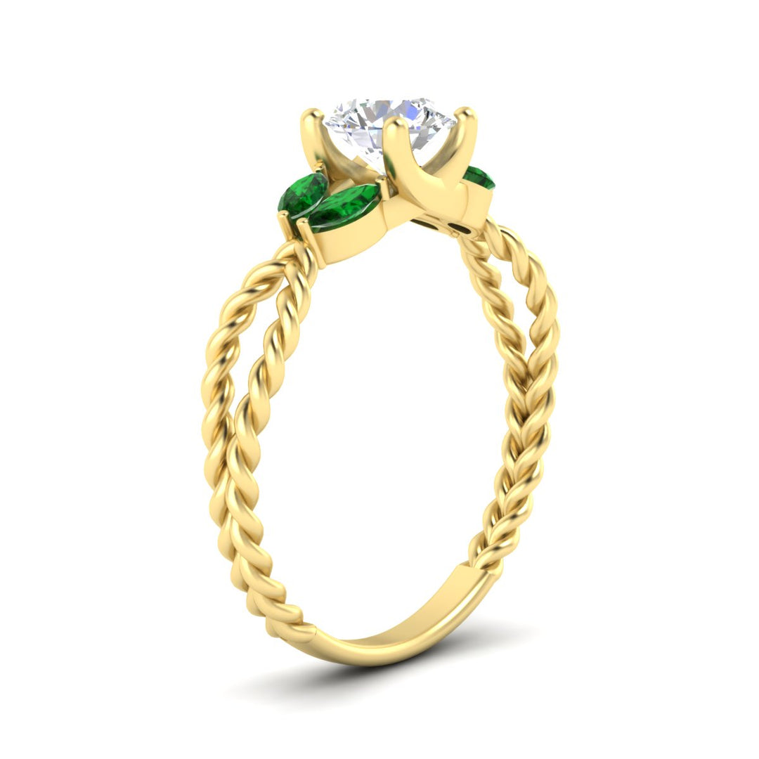 round-cut-twisted-leaf-emerald-split-engagement-ring-in-yellow-gold-fdenr1084gemgrangle2-nl-yg.jpg?v=1764581094