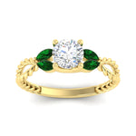 Load image into Gallery viewer, round-cut-twisted-leaf-emerald-split-engagement-ring-in-yellow-gold-fdenr1084gemgrangle5-nl-yg_32dfcc3c-96c1-41a1-9555-a50095829817.jpg?v=1764581107
