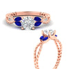 Load image into Gallery viewer, round-cut-twisted-leaf-sapphire-split-engagement-ring-in-rose-gold-fdenr1084gsablangle3-nl-rg.jpg?v=1764581094