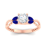 Load image into Gallery viewer, round-cut-twisted-leaf-sapphire-split-engagement-ring-in-rose-gold-fdenr1084gsablangle5-nl-rg_b3c52678-5775-4b6e-b26d-192cc4d9f2fe.jpg?v=1764581107
