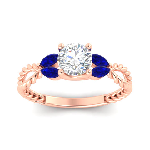 round-cut-twisted-leaf-sapphire-split-engagement-ring-in-rose-gold-fdenr1084gsablangle5-nl-rg_b3c52678-5775-4b6e-b26d-192cc4d9f2fe.jpg?v=1764581107