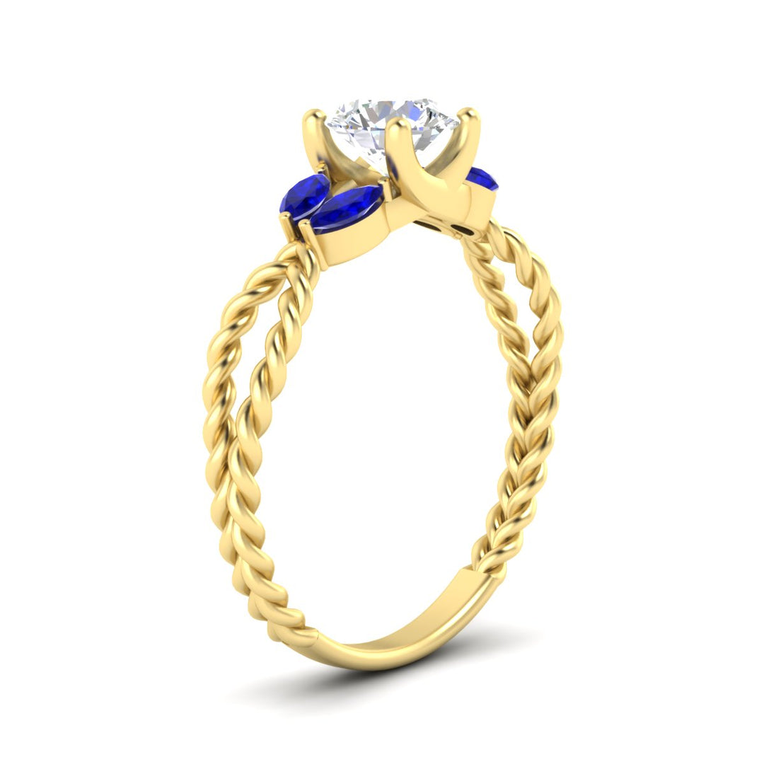 round-cut-twisted-leaf-sapphire-split-engagement-ring-in-yellow-gold-fdenr1084gsablangle2-nl-yg.jpg?v=1764581094