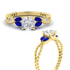 Load image into Gallery viewer, round-cut-twisted-leaf-sapphire-split-engagement-ring-in-yellow-gold-fdenr1084gsablangle3-nl-yg.jpg?v=1764581094