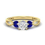 Load image into Gallery viewer, round-cut-twisted-leaf-sapphire-split-engagement-ring-in-yellow-gold-fdenr1084gsablsleep-nl-yg.jpg?v=1764581094
