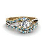 Load image into Gallery viewer, round-cut-two-tone-3-stone-diamond-swirl-bridal-set-with-ice-blue-topaz-in-FDO50895ROGICBLTO-NL-YG
