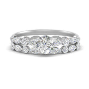 round-diamond-floating-marquise-accent-ring-with-eternity-wedding-band-in-white-gold-FDEWB9398RO-NL-WG.jpg?v=1758802329
