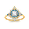 Load image into Gallery viewer, round-halo-floral-blue-topaz-engagement-ring-in-yellow-gold-FD9822RORGICBLTOANGLE5-NL-YG_e061e3e7-107c-40cd-bbc1-7aece39bc0c7?v=1755852240