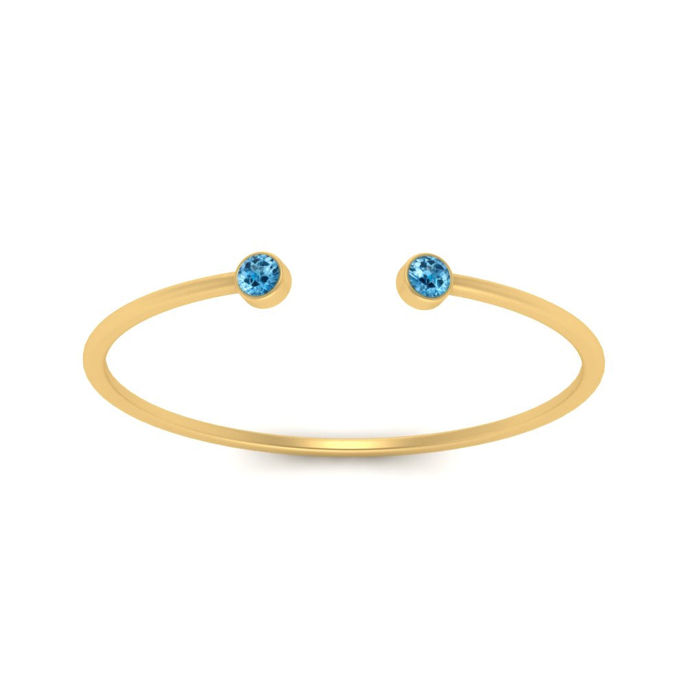 round-minimalist-open-blue-topaz-stacking-ring-in-yellow-gold-FD9404RORGICBLTO-NL-YG.jpg