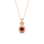 Load image into Gallery viewer, round-ruby-solitaire-infinity-knot-pendant-in-rose-gold

