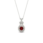 Load image into Gallery viewer, round-ruby-solitaire-infinity-knot-pendant-in-white-gold
