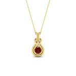 Load image into Gallery viewer, round-ruby-solitaire-infinity-knot-pendant-in-yellow-gold
