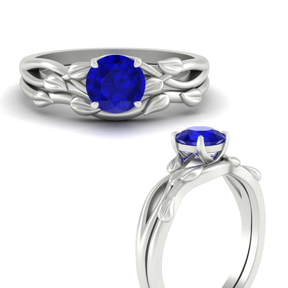 round-sapphire-solitaire-ring-vine-leaf-design-in-platinum-fdens11688rogsablangle3-nl-wg.jpg?v=1777271505