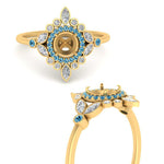 Load image into Gallery viewer, semi-mount-halo-floral-blue-topaz-engagement-ring-in-yellow-gold-FD9822SMRGICBLTOANGLE3-NL-YG?v=1755852257
