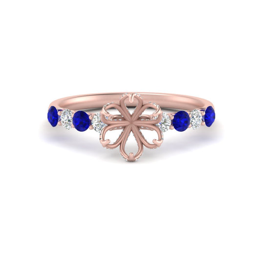 semi-mount-prong-studded-sapphire-accented-solitaire-engagement-ring-in-FD10955SMRGSABLANGLE3-NL-RG