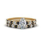 Load image into Gallery viewer, shared-prong-oval-engagement-and-wedding-ring-set-with-black-diamond-in-FDENS3023OVGBLACK-NL-YG

