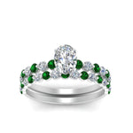 Load image into Gallery viewer, shared-prong-oval-engagement-and-wedding-ring-set-with-emerald-in-FDENS3023OVGEMGR-NL-WG

