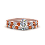 Load image into Gallery viewer, shared-prong-oval-engagement-and-wedding-ring-set-with-orange-sapphire-in-FDENS3023OVGSAOR-NL-RG
