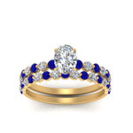 Load image into Gallery viewer, shared-prong-oval-engagement-and-wedding-ring-set-with-sapphire-in-FDENS3023OVGSABL-NL-YG
