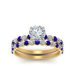 Load image into Gallery viewer, shared-prong-round-engagement-and-wedding-ring-set-with-sapphire-in-FDENS3023ROGSABL-NL-YG
