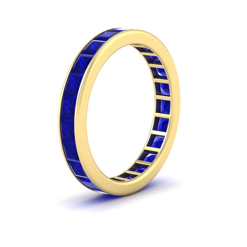 simple-5-carat-princess-cut-sapphire-eternity-ring-in-yellow-gold-FDEWB160PRBGSABLANGLE2-5.00CT-NL-YG.jpg?v=1766128425