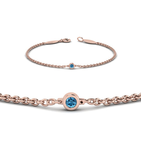 single-diamond-chain-bracelet-with-ice-blue-topaz-in-14k-rose-gold-fdbr651576gicbltoangle2-nl-rg