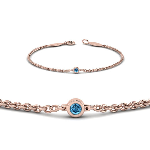 single-diamond-chain-bracelet-with-ice-blue-topaz-in-14k-rose-gold-fdbr651576gicbltoangle2-nl-rg