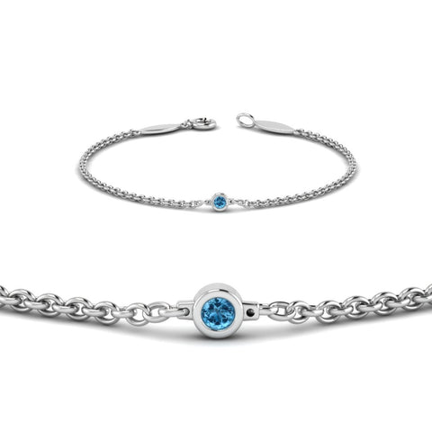 single-diamond-chain-bracelet-with-ice-blue-topaz-in-14k-white-gold-fdbr651576gicbltoangle2-nl-wg