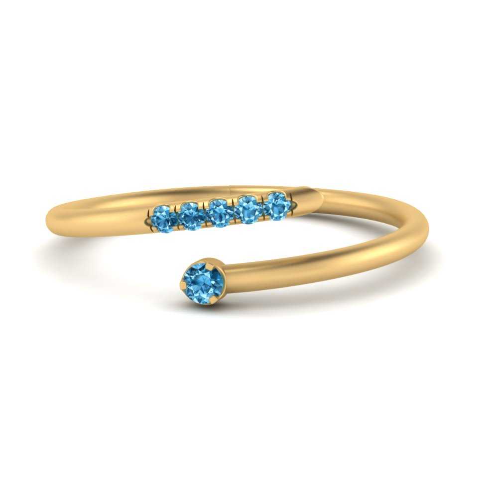 spiral-stacking-blue-topaz-ring-in-yellow-gold-FD9552GICBLTO-NL-YG.jpg