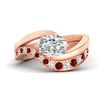 Load image into Gallery viewer, swirl-oval-east-west-ruby-wedding-ring-set-in-rose-gold-fd11522grudr-nl-rg
