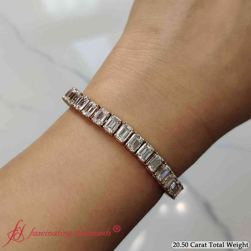 tennis-bracelet-basket-set-emerald-cut-20-carat-in-yellow-gold-fdbrc10449em-20-00-ct-fancy-2-yg.jpg