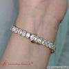 Load image into Gallery viewer, tennis-bracelet-basket-set-emerald-cut-20-carat-in-yellow-gold-fdbrc10449em-20-00-ct-fancy-3-yg.jpg
