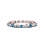 Load image into Gallery viewer, thin-marquise-and-round-eternity-wedding-band-with-blue-topaz-in-rose-gold-FDEWB9403GICBLTO-NL-RG
