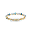 Load image into Gallery viewer, thin-marquise-and-round-eternity-wedding-band-with-blue-topaz-in-yellow-gold-FDEWB9403GICBLTOANGLE5-NL-YG