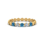 Load image into Gallery viewer, thin-round-diamond-stack-band-with-blue-topaz-in-yellow-gold-FD9548BGICBLTO-NL-YG.jpg
