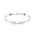 Load image into Gallery viewer, thin-space-out-stackable-diamond-band-with-blue-topaz-in-white-gold-FDEWB9437RORGICBLTOANGLE5-NL-WG
