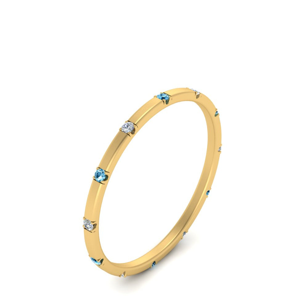 thin-space-out-stackable-diamond-band-with-blue-topaz-in-yellow-gold-FDEWB9437RORGICBLTOANGLE2-NL-YG