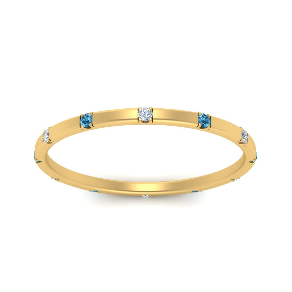 thin-space-out-stackable-diamond-band-with-blue-topaz-in-yellow-gold-FDEWB9437RORGICBLTOANGLE5-NL-YG