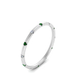 Load image into Gallery viewer, thin-space-out-stackable-diamond-band-with-emerald-in-white-gold-FDEWB9437RORGEMGRANGLE2-NL-WG
