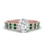 Load image into Gallery viewer, three-quarter-oval-shaped-diamond-gallery-bridal-ring-set-with-emerald-in-FD9168OVGEMGRANGLE3-NL-RG

