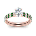 Load image into Gallery viewer, three-quarter-oval-shaped-diamond-gallery-bridal-ring-set-with-emerald-in-FD9168OVGEMGRANGLE3-NL-RG
