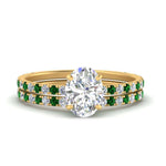 Load image into Gallery viewer, three-quarter-oval-shaped-diamond-gallery-bridal-ring-set-with-emerald-in-FD9168OVGEMGRANGLE3-NL-YG
