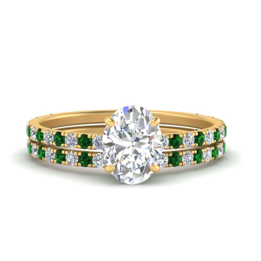 three-quarter-oval-shaped-diamond-gallery-bridal-ring-set-with-emerald-in-FD9168OVGEMGRANGLE3-NL-YG
