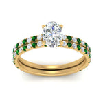 Load image into Gallery viewer, three-quarter-oval-shaped-diamond-gallery-bridal-ring-set-with-emerald-in-FD9168OVGEMGRANGLE3-NL-YG