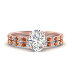 Load image into Gallery viewer, three-quarter-oval-shaped-diamond-gallery-bridal-ring-set-with-orange-sapphire-in-FD9168OVGSAORANGLE3-NL-RG
