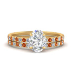 Load image into Gallery viewer, three-quarter-oval-shaped-diamond-gallery-bridal-ring-set-with-orange-sapphire-in-FD9168OVGSAORANGLE3-NL-YG